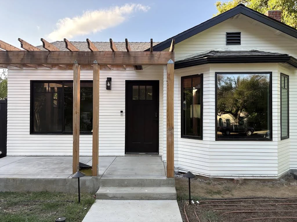 Completed exterior siding and trim project by M R Painting & Cleaning